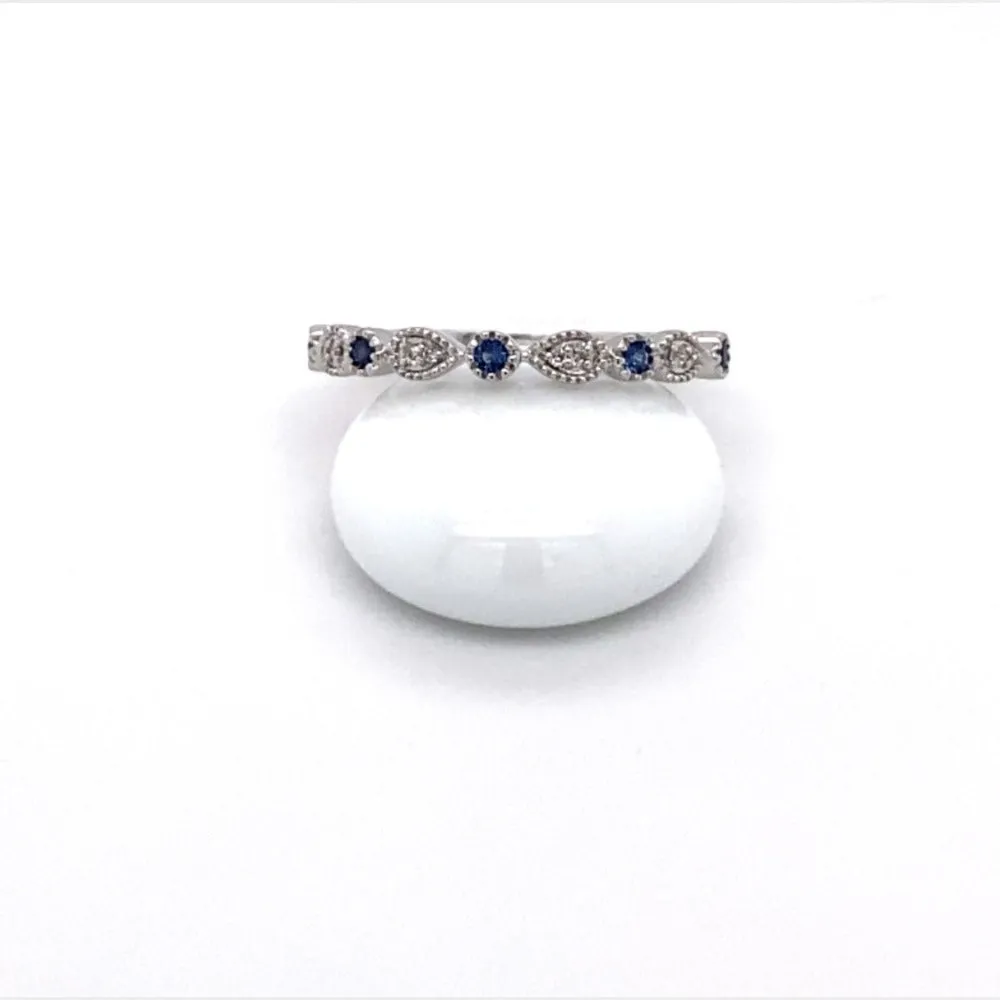 14K White gold Sapphire and diamond milgrain band.